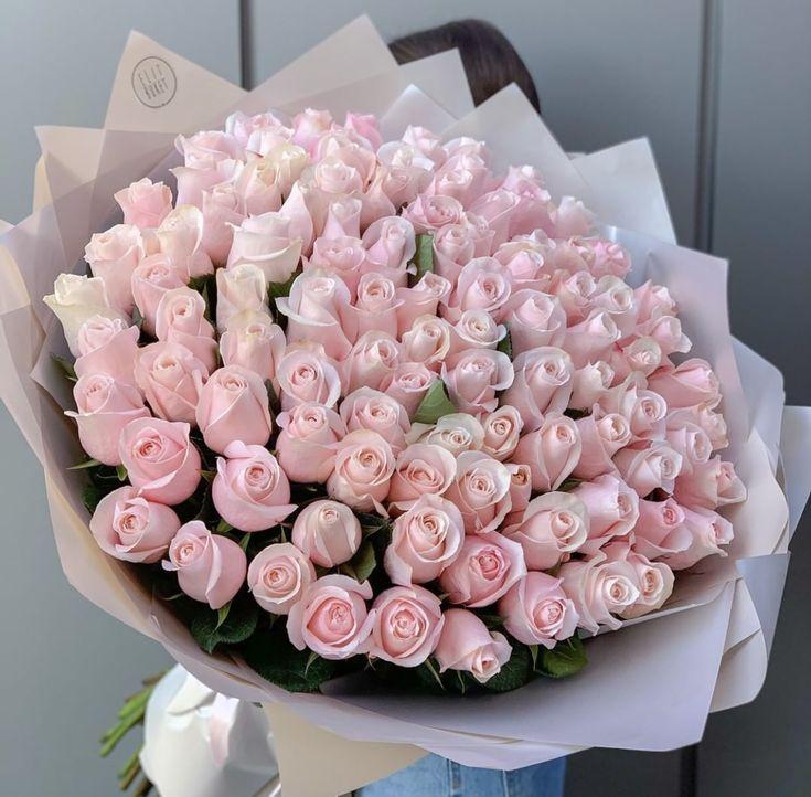 Corporate meeting room with meticulously timed floral arrangements maintaining elegance throughout business hours